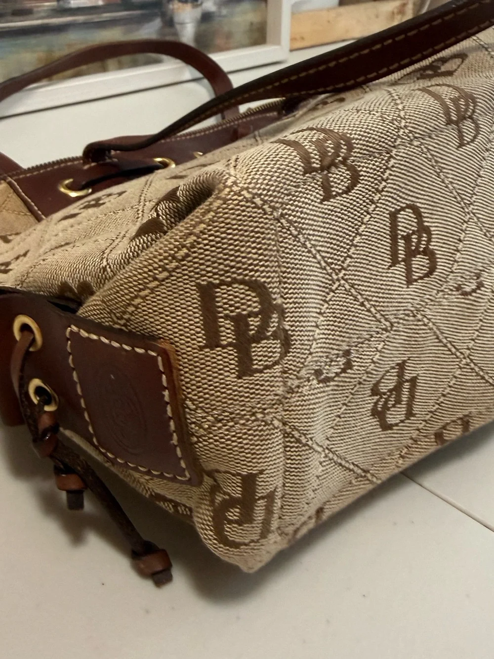 Dooney & Bourke Beige Monogram Quilted Tote with Brown Leather Trim